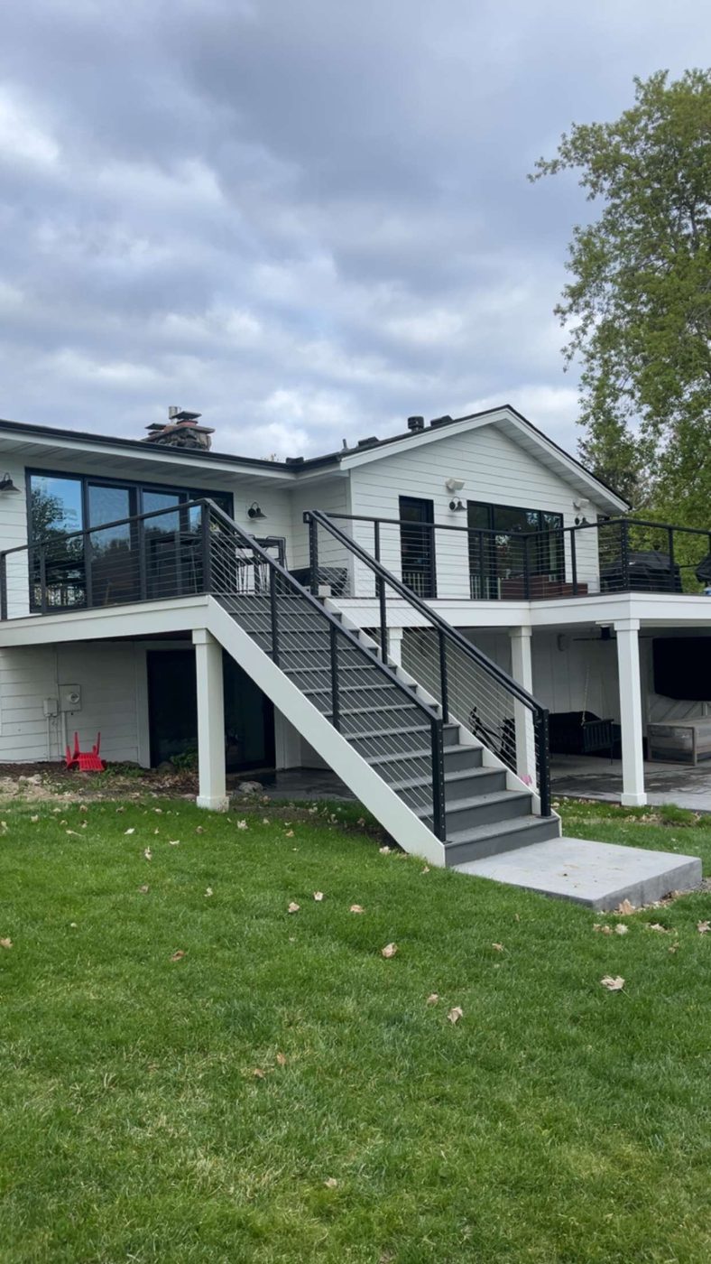 Spotless exterior windows on a modern lakeside home
