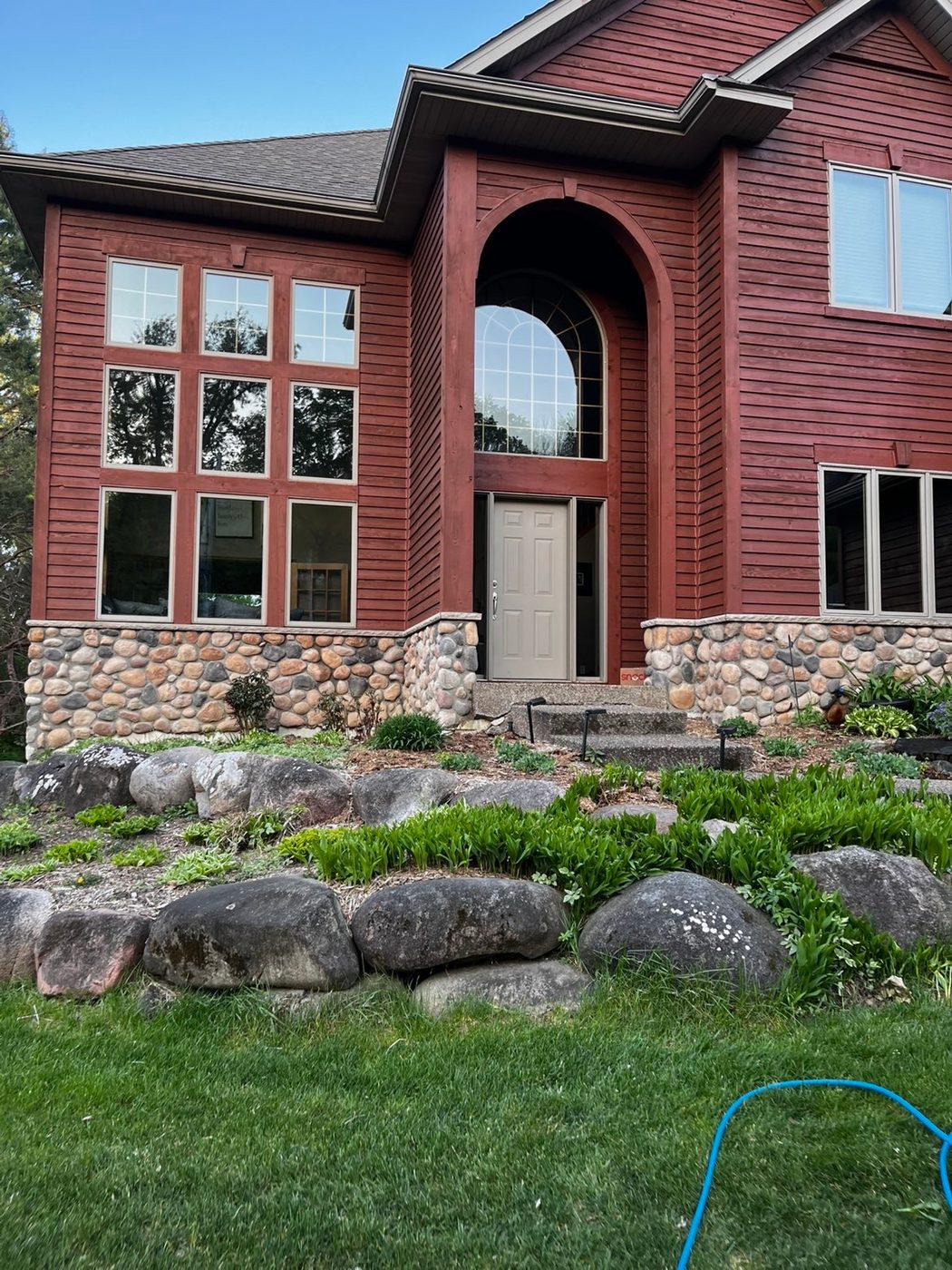 Crystal-clear windows on a two-story residential home